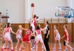 NBA basketball players playing in a basketball court which can be watched with NBA streaming sites